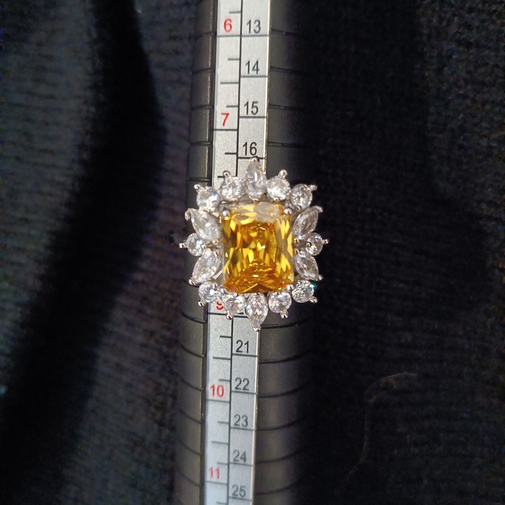 Elegant Yellow Gemstone Ring with Silver Accents - Picture 2 of 3